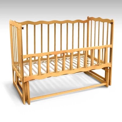 Дитяче дерев'яне ліжко з відкидним бортиком та маятником "Хвиля" вільха - колір світло-коричневий фото 1